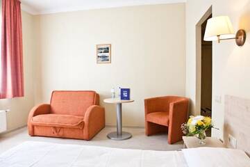 Фото номера Улучшенный двухместный номер с 1 кроватью Отель Kolonna Hotel Rēzekne г. Резекне 3
